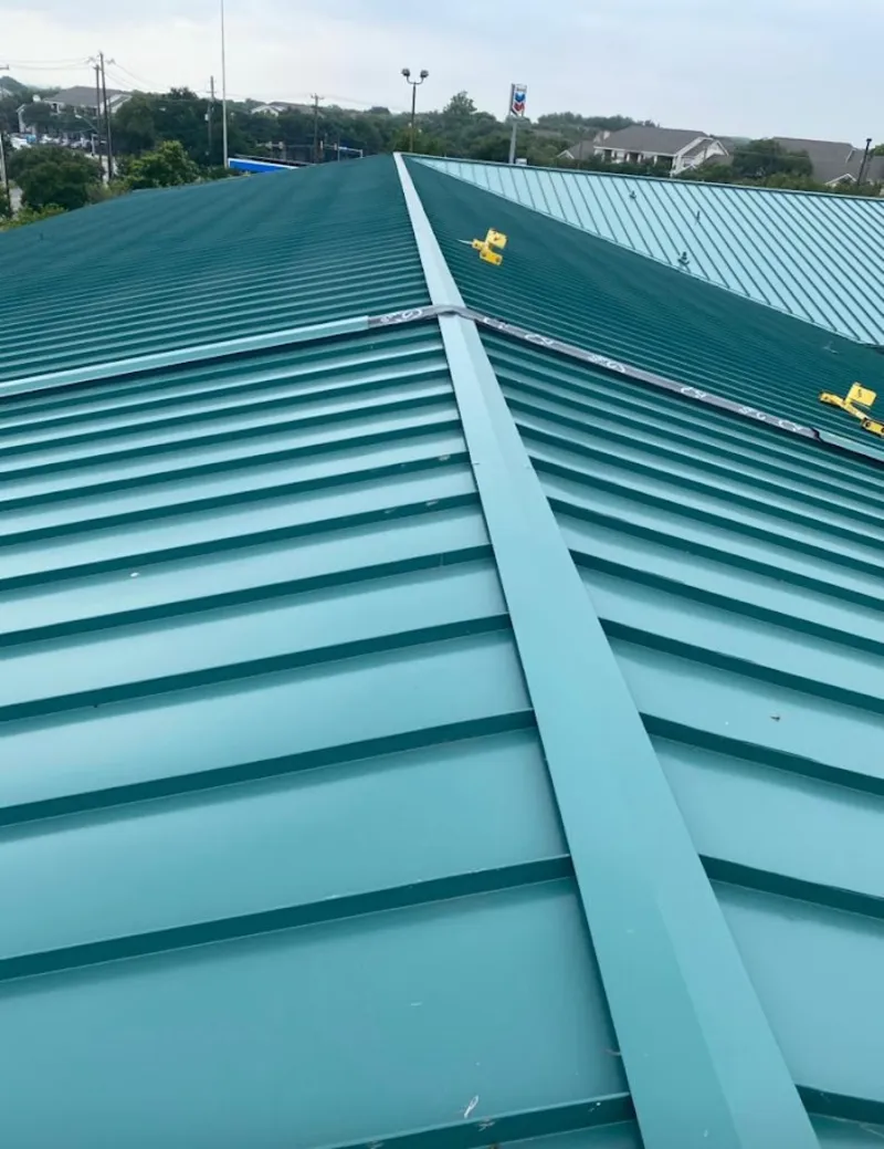 Green commercial metal roof ridge and valley for Metal Roof Repair in Prescott Valley